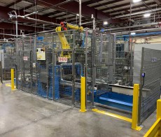 attrezzature asservimento macchine e automatismi di produzione - automatismi di produzione - Robot scarico pile pressa